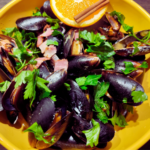 Christmas Mussels with Bacon, Cider, and Orange